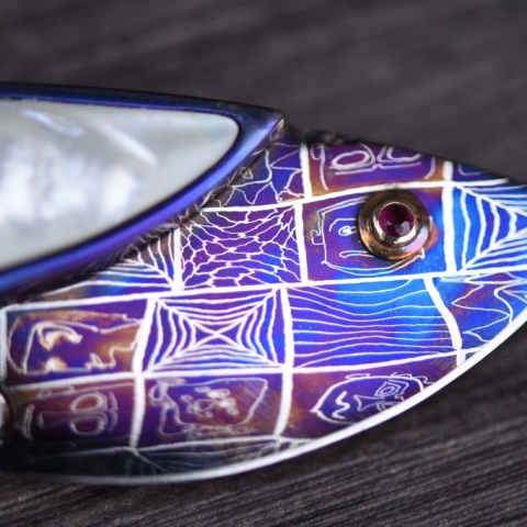 closeup of the patterns in the purple and blue damascus