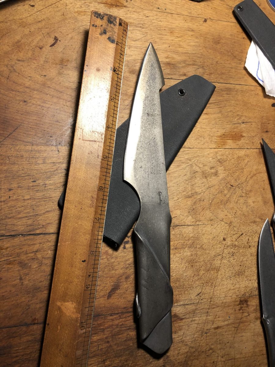 homemade knife with ruler for scale