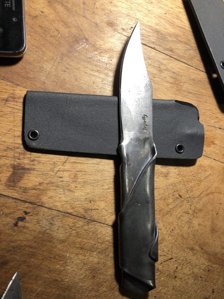 homemade knife with leather handle and sheath