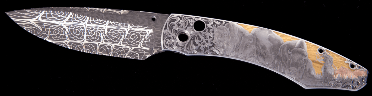 knife with a buffalo handle and a damascus pattern reminicent of dreamcatchers